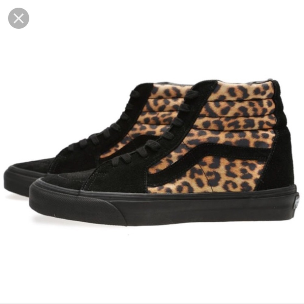 Black leopard print high top vans
